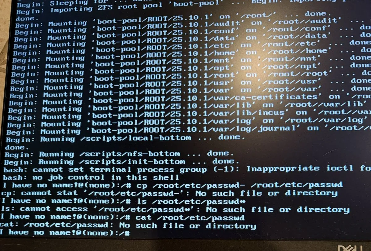 Close-up of the same shell: cp /root/etc/passwd- fails with no such file, ls shows no passwd files at all, and cat confirms /root/etc/passwd itself is gone